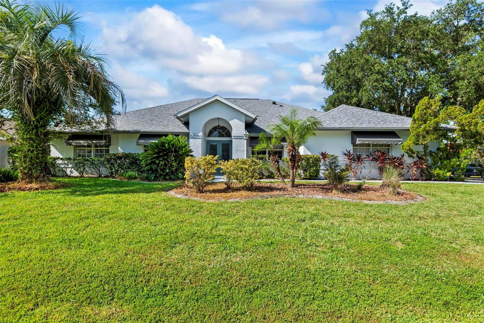 Spacious 4-Bed, 3-Bath Home with Split Layout, Pool & Huge Yard!
This beautifully maintained 4-bedroom, 3-bath home is the perfect setup for multi-generational living, guests, or just having extra space to spread out. Sitting on a oversize, professionally landscaped corner lot with large covered patio, fully screened private pool and custom storage shed, this one really has it all!
Inside, the smart split-floor plan offers great privacy and flexibility. One side of the home features two bedrooms and two full bathrooms, including a spacious primary suite. On the other side, you’ll find two more bedrooms and a full bath — ideal for families, guests, or even a home office setup. This third bath is also accessible from the pool area!
The kitchen has been updated with modern finishes, includes a Breakfast Nook and flows into a bright family room, living room and dining room filled with natural light. Step out back and you’ll love the oversized yard, lush landscaping, and sparkling pool — great for summer BBQs, relaxing weekends, or entertaining friends.
With updates like Plantation Shutters, Travertine Floors, new roof in 2023, enjoy a flexible layout, and plenty of outdoor space. This home is move-in ready and located close to schools, shopping, and everything you need. 1 Year Home Warranty provided to the Buyers at closing!
Come see it for yourself — you’ll love the space and the setup!