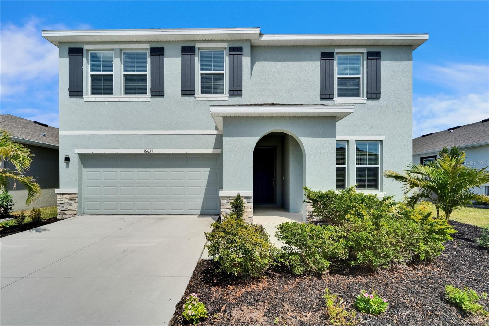 Welcome to your dream home in the highly sought-after South Shore Bay community, home of the stunning Crystal Lagoon! This beautiful 5-bedroom, 3-bathroom residence, built in 2023, perfectly blends modern style with everyday comfort. The spacious kitchen is the heart of the home, offering granite countertops, sleek cabinetry, and a large island, ideal for entertaining or family gatherings. The primary suite is a true retreat, complete with a spa-like bathroom featuring dual vanities, a garden tub, and a separate walk-in shower. Step outside to enjoy a large yard with serene pond views, perfect for morning coffee or weekend barbecues. Beyond your doorstep, the South Shore Bay Crystal Lagoon provides a resort-style lifestyle with sandy beaches, swimming, kayaking, and endless recreation. Schedule your private showing today!