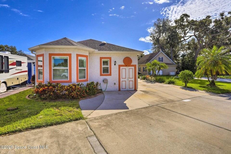 Photo of 1809 Meander Lane #306, Titusville, FL 32796 (MLS # O6449511)