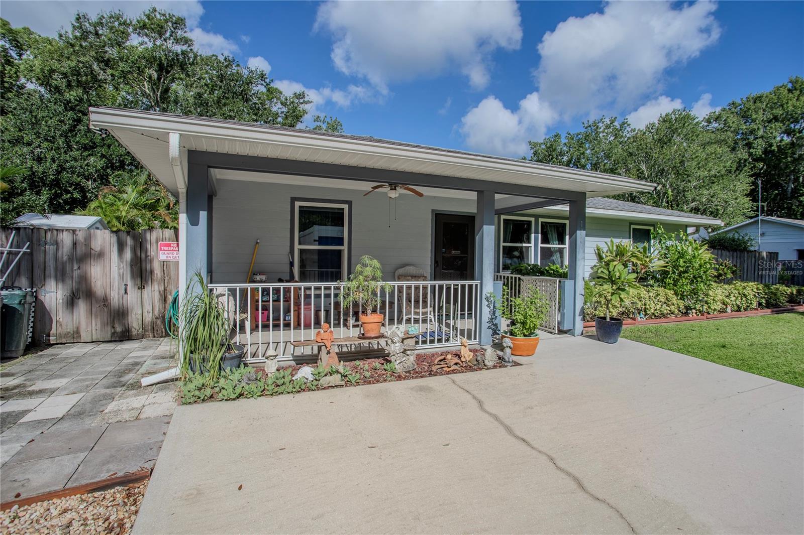 Under contract-accepting backup offers. One or more photo(s) has been virtually staged. Welcome to 180 Spruce St—efficient coastal living just minutes from New Smyrna Beach. Built as a Habitat for Humanity 5-Star efficiency home (per seller), this easy-to-love residence flows with hard-surface floors throughout and a split bedroom plan that offers privacy and an accessible layout.Morning coffee on the wood deck overlooks the landscaped backyard and the natural wetlands beyond. After a quick 7-minute trip to the beach, rinse off in the outdoor shower and tuck your gear away in the storage shed. Inside, the kitchen invites everyday cooking with a pantry and a gas range—plus an outlet is in place if an electric stove is preferred. An inside laundry room with washer/dryer hookups keeps chores convenient. Energy-minded features include a tankless water heater, original blown-in insulation, double-pane windows, and hurricane shutters. Blinds convey; curtains do not. Located close to shopping and everyday essentials, this home blends comfort, practicality, and coastal convenience. Flood Zone X per public records.