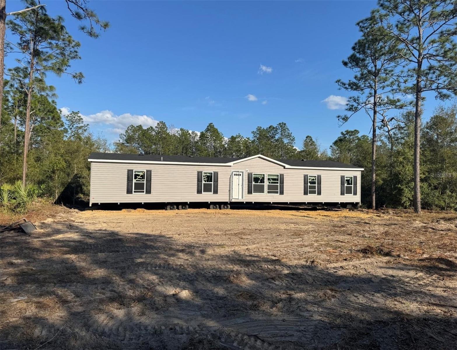 Excellent opportunity to own a BRAND NEW, Spacious Manufactured Home in Crystal Ri ver. It is settled on .23 acre and features 4 spacious bedrooms and two full bathrooms. Everything is new! Brand-new HVAC, roof and kitchen appliances. Own your lot! One of the key highlights of this home is the absence of an HOA, offering homeowners freedom from restrictive rules and additional fees. Experience the benefits of new construction, including energy-efficient windows, contemporary finishes, and a floor plan designed for today's lifestyle. The open concept living area provides a seamless flow between the kitchen with spacious pantry, dining, and living room. Big laundry room with its own entrance. Natural light floods the space making it looks modern and functional. New septic system and the well. Financeable, Insurable with abundant space to spread out inside or outside to enjoy family, friends and plenty of private space to find your quiet zone. Master bathroom has shower and garden tub. All bedrooms have walk-in closets.
