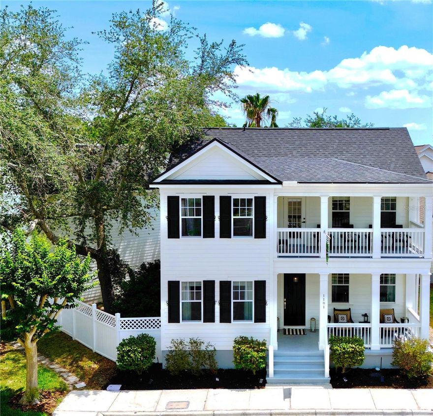 A UNIQUE opportunity to own a 5-bedroom home with 2 balconies, a SALTWATER POOL, SPA and INCOME GENERATING potential with a DETACHED GARAGE APARTMENT on a quiet CUL DE SAC in the highly desirable South Village in the ORIGINAL TOWN OF CELEBRATION, the iconic, master-planned community developed by Disney, located just minutes from Walt Disney World BY SIDE STREET. The EXTERIOR has been freshly PAINTED in 2024 and a NEW ROOF was installed in 2022. This Colonial Revival plan home features a GARAGE APARTMENT over the detached garage. In the main house: a luxurious PRIMARY BEDROOM ON THE FIRST FLOOR with a walk-in closet, and double doors leading into a remodeled ensuite bathroom with dual sink vanities with quartz countertops, a spacious walk-in shower, bathtub and privacy water closet. The primary suite overlooks the backyard oasis with a sparkling saltwater pool and spa, fully screened. There are 10-foot ceilings throughout the first floor from the formal dining room, front room, family room to the REMODELED KITCHEN which features NEW SUBWAY TILE backsplash (2025), NEW QUARTZ FARM SINK 33 inch (2025), high end hardware (2025), and a NEW OVEN (2025) plus natural stone countertops, with both a 4 seat bar and eat in breakfast nook. The kitchen is appointed with stainless steel appliances: refrigerator, dishwasher, and microwave. Upstairs, you'll find 3 additional bedrooms, a full bathroom and an upstairs piazza/balcony to watch sunsets, hot air balloons as they float over South Village. In addition to the 4 bedrooms in the main home, this property has a garage apartment with all NEW LVP FLOORING in 2024, with a full kitchen, full bathroom and laundry closet including a washer and dryer, for an income generating opportunity, guests or multigenerational living. Tenants will have access to the South Village pool & spa at Heritage Park. All interior doors in both the the home and the apartment have been updated with all new high end hardware: knobs and hinges in 2025. Both front doors to the home and the apartment have new doorknobs and deadbolts in 2025. The French exterior doors in the home have also been updated with new doorknobs and deadbolts in 2025. All new high end hardware on the kitchen cabinets and bathrooms in 2025. The property has 3 backyards, all fenced and gated, plenty of room for sports, a dog run, golf cart parking, etc. Residents of the South Village of the original town of Celebration enjoy living walking & biking distance to the charming waterfront downtown Celebration shops, restaurants, Post Office, Town Hall, Starbucks, Lake Rianhard and the weekly Farmers Market. Downtown Celebration hosts a variety of town events & holiday celebrations throughout the year, enhancing the sense of community. The original town of Celebration features over 26 miles of biking/walking trails, the Robert Trent Jr GOLF COURSE, TENNIS COURTS, basketball courts, sand volleyball courts, a dog park, 6 private clubhouses accessible only by Celebration residents with geothermal-heated saltwater pools and spas. Tenants will have access to the clubhouse pools.  Celebration is also a golf cart community. Don’t miss this incredibly UNIQUE opportunity to own a spacious home in the highly desirable, serene South Village of Celebration. Schedule a showing today!