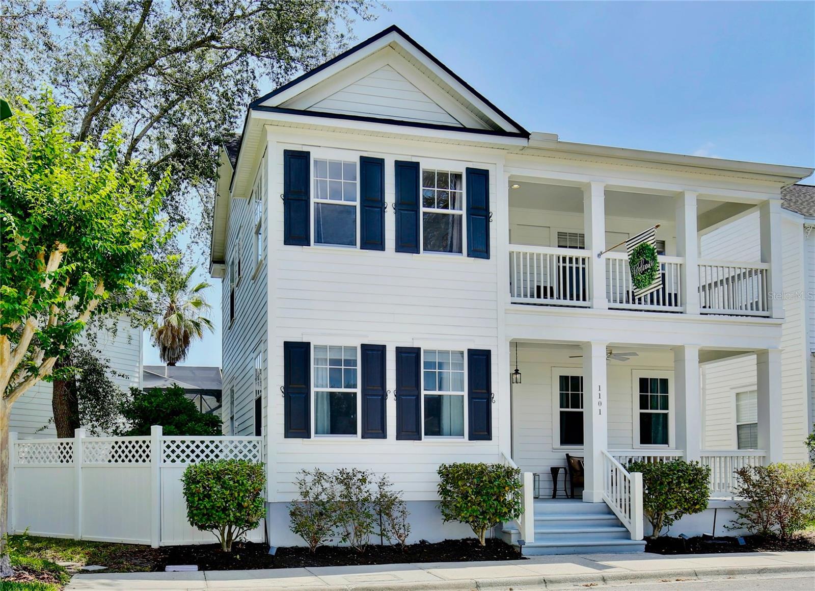 A rare opportunity to own a 5-bedroom home with a SALTWATER POOL, SPA and INCOME GENERATING potential GARAGE APARTMENT in the quiet, highly desirable South Village of Celebration, the iconic, master-planned community developed by Disney, located just minutes from Walt Disney World. The EXTERIOR has been freshly PAINTED in 2024 and a NEW ROOF was installed in 2022. This home features a GARAGE APARTMENT over the detached garage. In the main house: a luxurious PRIMARY BEDROOM ON THE FIRST FLOOR with a walk-in closet, and double doors leading into a remodeled ensuite bathroom with dual sink vanities with quartz countertops, a spacious walk-in shower, bathtub and privacy water closet. The primary suite overlooks the backyard oasis with a sparkling saltwater pool and spa, fully screened. There are 10-foot ceilings throughout the first floor from the formal dining room, front room, family room to the REMODELED KITCHEN which features NEW SUBWAY TILE backsplash (2025), NEW QUARTZ FARM SINK 33 inch (2025), high end hardware (2025), and a NEW OVEN (2025) plus natural stone countertops, with both a 4 seat bar and eat in breakfast nook. The kitchen is appointed with stainless steel appliances: refrigerator, dishwasher, and microwave. Upstairs, you'll find 3 additional bedrooms, a full bathroom and an upstairs piazza/balcony. In addition to the 4 bedrooms in the main home, this property has a garage apartment with all NEW LVP FLOORING in 2024, with a full kitchen, full bathroom and laundry closet including a washer and dryer, for an income generating opportunity, guests or multigenerational living. All interior doors in both the the home and the apartment have been updated with all new high end hardware: knobs and hinges in 2025. Both front doors to the home and the apartment have new doorknobs and deadbolts in 2025. The French exterior doors in the home have also been updated with new doorknobs and deadbolts in 2025. All new high end hardware on the kitchen cabinets and bathrooms in 2025. The property has 3 backyards, all fenced and gated, plenty of room for sports, a dog run, golf cart parking, etc. Residents of South Village enjoy living walking & biking distance to the charming waterfront downtown Celebration shops, restaurants, Post Office, Town Hall, Starbucks, Lake Rianhard and the weekly Farmers Market. Celebration hosts a variety of town events & holiday celebrations throughout the year, enhancing the sense of community. Celebration features over 26 miles of biking/walking trails, the Robert Trent Jr GOLF COURSE, TENNIS COURTS, basketball courts, sand volleyball courts, a dog park, 6 private clubhouses accessible only by Celebration residents with geothermal-heated saltwater pools and spas. Celebration is also a golf cart community. Don’t miss this incredible opportunity to own a spacious home in the highly desirable, serene South Village of Celebration. Schedule a showing today!