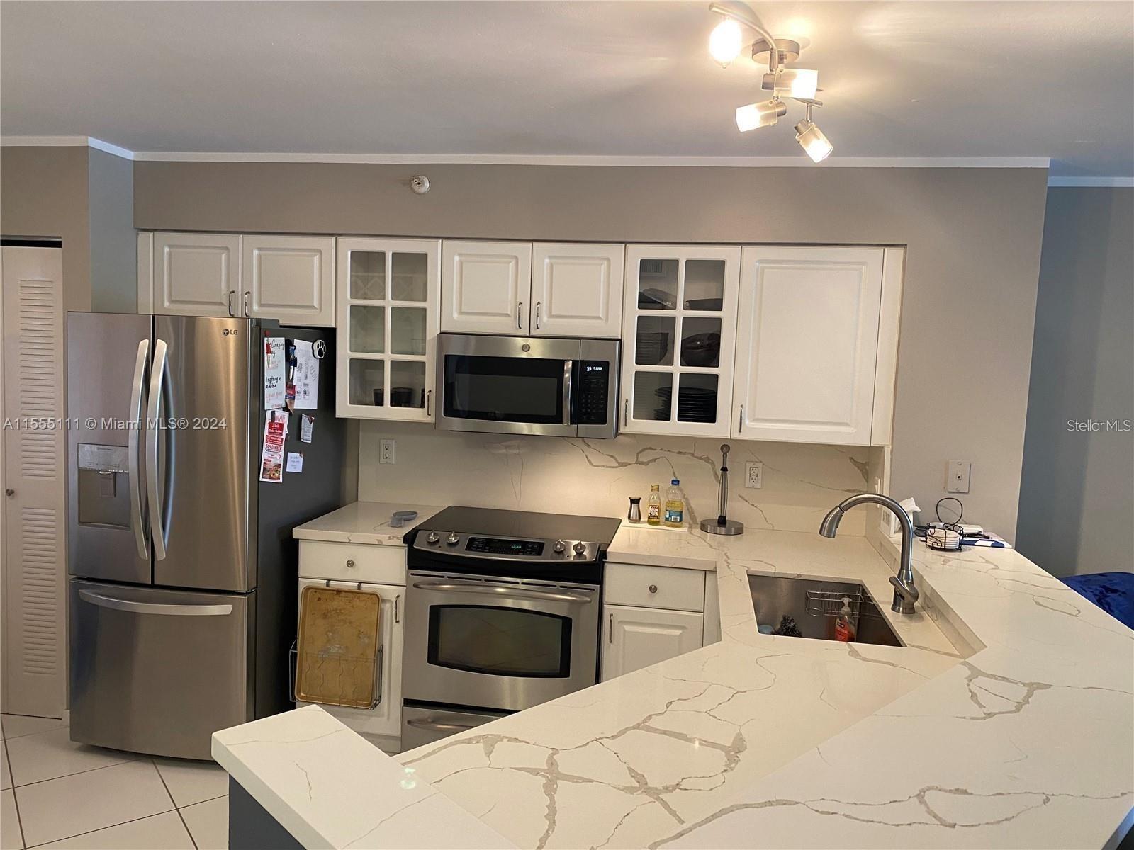 2205 S CYPRESS BEND DR, #302 2205