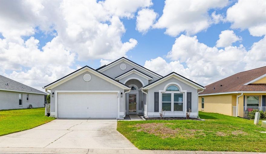 ARE YOU LOOKING FOR A HOME WITH THE PERFECT BLEND OF STYLE, COMFORT AND PEACE OF MIND? This beautifully updated 4-bedroom pool home with NO Rear Neighbors will not disappoint! From the moment you arrive, you will appreciate the extensive upgrades and the pride of ownership throughout.                                                                                                                                                                                                          
Upon entrance your are be greeted by an Open Floor Plan with Beautiful Faux Wood Tile throughout, so NO Carpet. With Vaulted Ceilings and lots of natural light, this 1654 sq ft home feels nice and spacious, with stylish updated features. A Stunning Spacious Updated Kitchen offers White Shaker Styled Cabinetry, Ample Counter Space with High End Formica Butterum imitation Granite Tops and Breakfast Bar, Newer Stainless Steel Appliances, complimenting the Tiled Back Splash. Further more, with the kitchen in the heart of the home you are not cut off from friends or the family when entertaining. The home has SPLIT Bedrooms for privacy and the Primary Suite offers Space, Walk In Closet and a Tiled Spacious Walk In Shower, The beautifully updated bathrooms completed between 2021-2023. This home provides flexibility for family living, guests, or a home office setup.

Outside, enjoy your own Private Florida Oasis with a sparkling screened-in RESURFACED Pool perfect for relaxing, entertaining, or enjoying sunny Florida days year-round. With so many major updates already completed, this home offers exceptional value, energy efficiency, and reduced future maintenance costs.
Major improvements have already been completed for the new owner, including a NEW ROOF (2020), SOLAR PANELS (2020/2021) that will be PAID OFF by the seller at closing, NEW WINDOWS (2022), pool resurfacing (2019), and a NEW POOL HEATER (2025), AC 2014, WATER HEATER 2025. With the big-ticket items already taken care of, giving you the perfect combination of comfort, style, and peace of mind. Whether you are looking for your forever home, a vacation retreat, or an investment opportunity, this property immediately stands out from the competition.

Conveniently located close to shopping, dining, major highways, attractions, and everything Central Florida has to offer, this move-in-ready home is truly a must-see. Homes with this level of upgrades and value do not last long — schedule your private showing today before it is gone