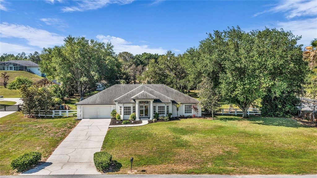 Photo of 12540 Cynthia Lane, Clermont, FL 34715 (MLS # O6403819)