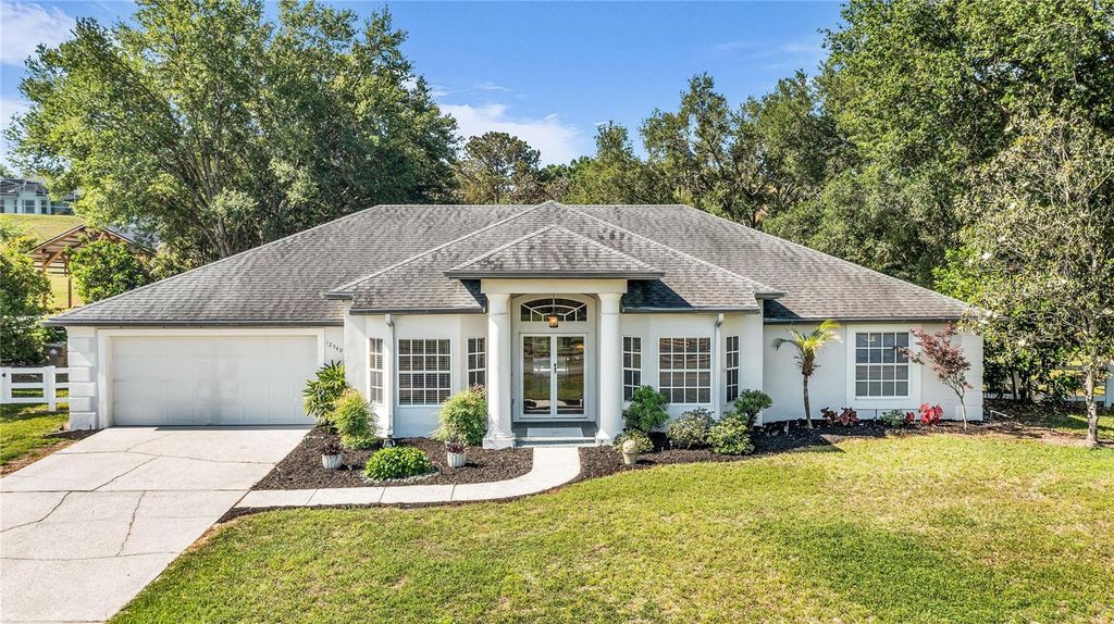 Photo of 12540 Cynthia Lane, Clermont, FL 34715 (MLS # O6403819)
