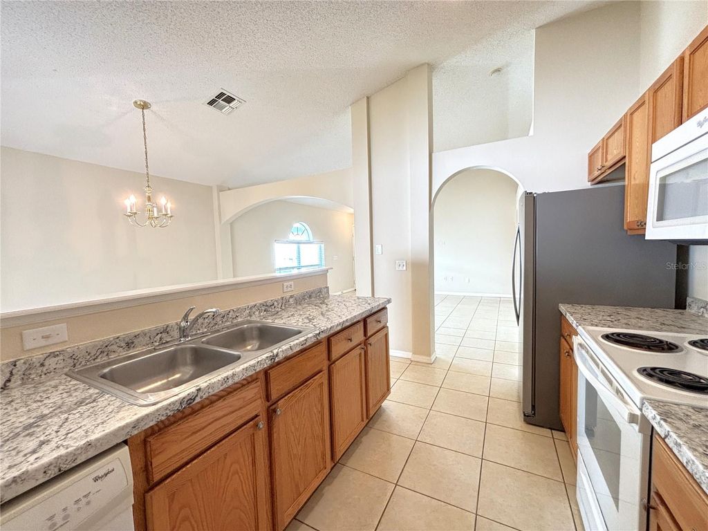 Photo of 30418 Birdhouse Drive, Wesley Chapel, FL 33545 (MLS # TB8406337)