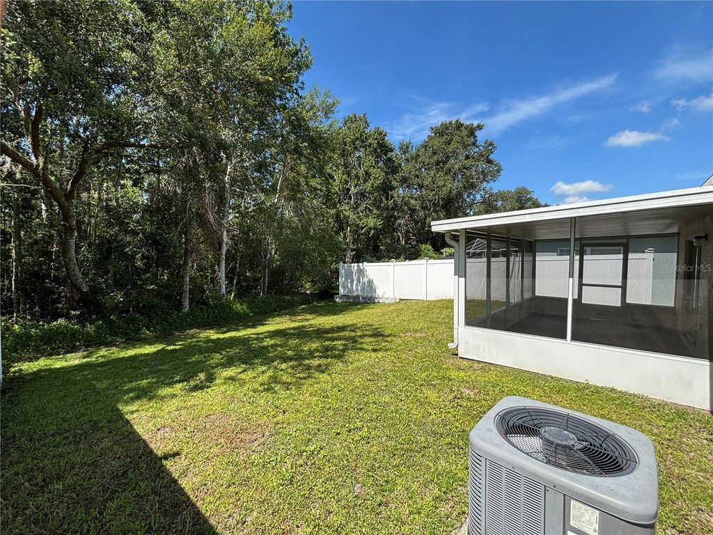 Photo of 30418 Birdhouse Drive, Wesley Chapel, FL 33545 (MLS # TB8406337)