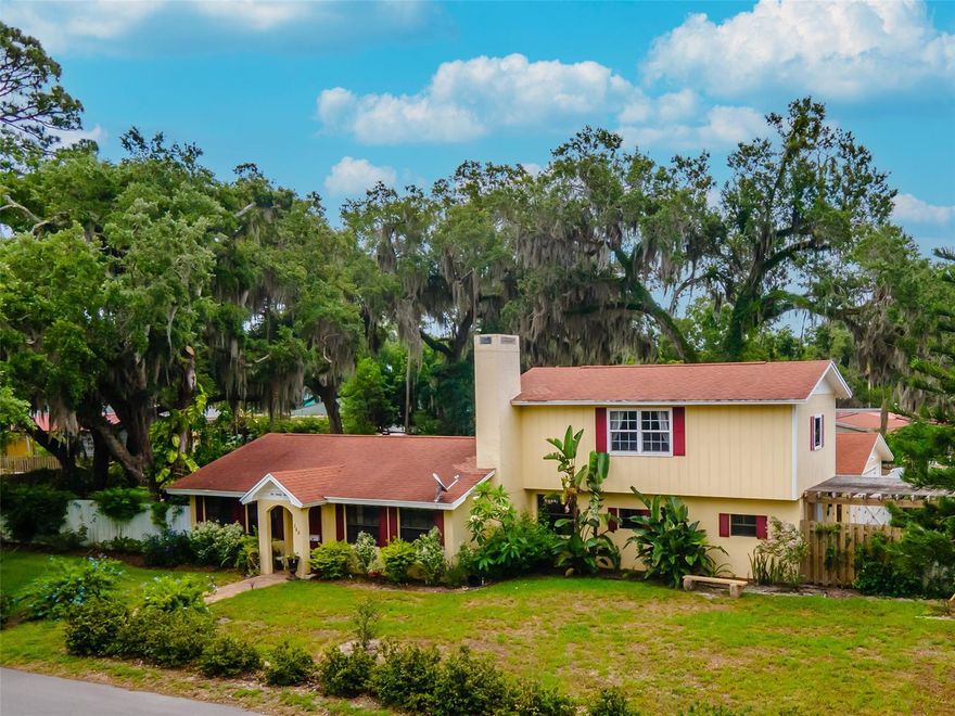 Welcome home to this charming 3 bedroom, 2 bath, 2-story home situated on a corner lot in NSB’s Historic Downtown area. The spacious, fenced yard gives you the privacy you are looking for within walking distance to the Canal St and less than 3 miles to the beach. Backyard features include a courtyard gazebo, tranquil goldfish pond, storage shed and plenty of room for a pool. Detached 2-car garage with a workshop with air conditioned office. Downstairs you will find two guest bedrooms, an updated kitchen, family room and a formal living area with a beautiful spiral staircase that leads you up to the spacious master suite. New hot water heater in 2019, refrigerator and dishwasher both replaced in 2017, 2014 Roof and AC. Call today to schedule your showing! ;Water: City