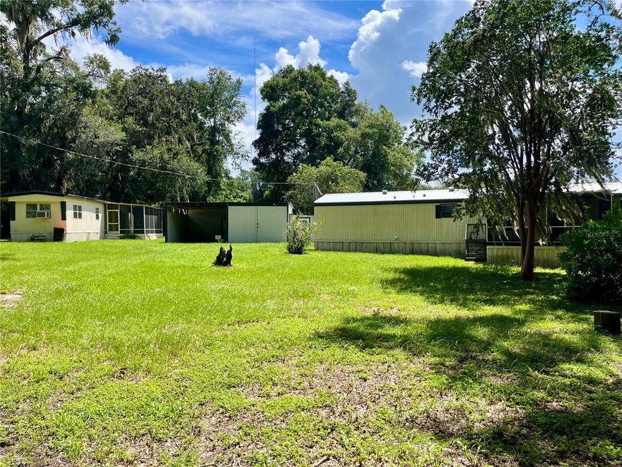 Here is a chance to own 2 manufactured homes on 1 Acre with A1 Zoning in Anthony, Florida with a large detached garage. First home is a 2 bedroom 2 bathroom manufactured home, and the other is a 1 bedroom, 1 bath. Neither mobile has carpet and both have spacious screen porches to enjoy the peace and tranquility on this full acre of land. Perfect for entertaining family and friends, letting the family pet run around, and just enjoying the nice views and landscaping that this property has to offer. This is a very unique opportunity to have 2 homes on A1 zoned property with privacy. Newer metal roof, AC unit, and well pump on 2/2 all done in past few years.  1/1 has newer window unit with heat and air. Property is down long dirt road that can be rough in spots, use caution.