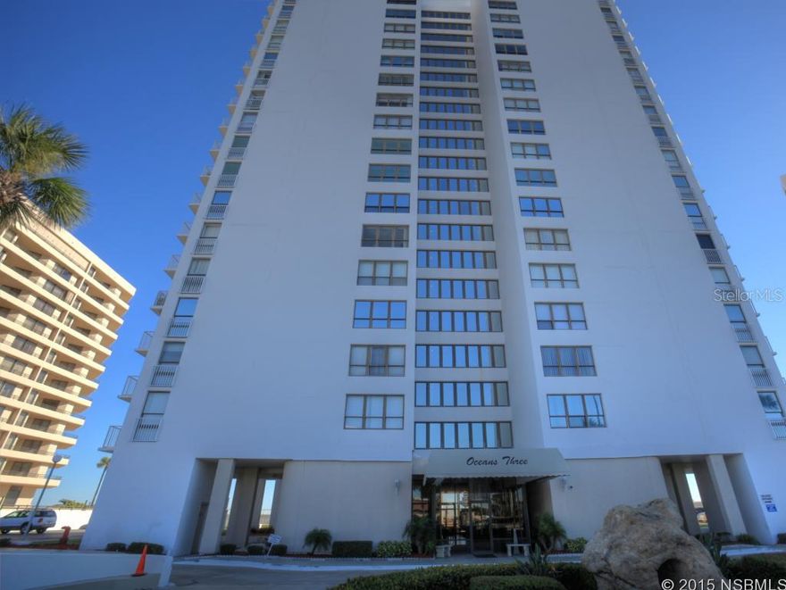 Please view the photos and the visual tour and place yourself in this pristine two bedroom, 2 bathroom condos on Daytona Beach Shores, newly renovated OCEANS THREE. The 1.4 million dollar complete remodeling of the lobby will be completed in about 3 weeks which will make for a contemporary, clean & chic look. Unit 606 complements the new building look perfectly with neutral tile though out except for beige carpet in bedrooms. In the open kitchen there are corian counter tops with stunning tumbled marble backsplash, long breakfast bar with decorative lighting, new refrigerator and microwave and lots of custom, blond wood cabinets with rich matte hardware.Plantation shutters are on every window to give a crisp,Florida look.Great ocean view from balcony that sweeps around the building to enable a view of magical sunsets.The bedrooms are split and bathrooms are updated. It's hard to decide which one is the main master as both resemble suites. Also important is the proximity to the newly redone Publix Supermarket which is directly across the street along with Walgreens, Bank of America, the Daytona Beach Shores City Hall offering lots of exercise classes and activities, golf course, etc. This unit has storage along with the laundry facility right outside the condo for your convenience. Also love the enormous beachfront pool and deck with grill.This is a move in ready condo so just bring your golf clubs,tooth brush and bathing suit and have fun. ;LocationDescription: Condo ;Water: City