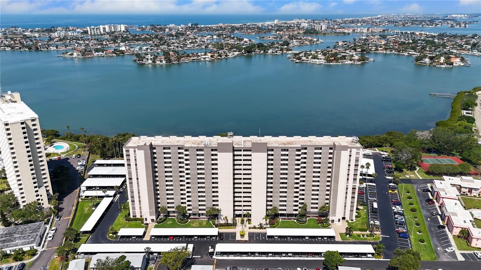 Welcome to Paradise in Pasadena! First-Floor Waterview Condo From Your Private Patio! Highly Sought after Chateau Towers makes this Furnished condo very desirable!!
Enjoy a park-like setting from this furnished 2 bedroom, 2 bathroom home perfectly situated on the first floor with peaceful water views. This updated unit features new hurricane-rated windows, a new HVAC system, and recently replaced refrigerator, microwave, and disposal for modern convenience. High-End furnishings, Washer and Dryer hook-up in the unit, Vinyl plank flooring throughout the main living area, updated lighting, storm door, Hurricane Sliders, ceiling fans and custom window treatments are just some of the many upgrades you will find. The spacious primary bedroom with its private en suite bathroom also boast a walk-in closet. There is also an additonal storage unit for all your Florida Toys located in the locked Laundry room.
Both bedrooms include brand new mattresses, and bathrooms are refreshed with updated toilets. Inside you’ll find a washer and dryer hookup, plus the building offers a laundry room just steps away for added convenience.
Relax and unwind by the community pool, and take advantage of your assigned covered parking space right outside your door. Enjoy the outdoors with direct access to Boca Ciega Bay, ideal for kayaking, paddleboarding, or watching dolphins play. The community offers a locked lobby with on-site management, a relaxing pool area, and is conveniently located steps to the Laundry room, and all the building amenties.
This condo combines modern upgrades, comfort, and waterfront lifestyle with the flexibility of a no age restriction community. This popular and conveniently located community offers something for everyone: Heated Pool, Spa, Fitness Center. Sauna, Steam room, Tennis Courts, Billiards, Ping Pong, Recreation area with a kitchen for tons of activities, Kayak/Paddleboard storage, and so much more. Our Beautiful Sugar Sand Beaches are just minutes away, even just a bike ride, or the Trolley, Publix, Dining and Retail are all in walking distance. Just a short drive to Downtown St. Petersburg, Art district of Gulfport and the airport. Milestone Inpsection completed...No Damage from Helene or Milton....Low HOA includes, water, trash, and cable, lawn service and all building maintenace. Don't Let This One Slip Away!!
