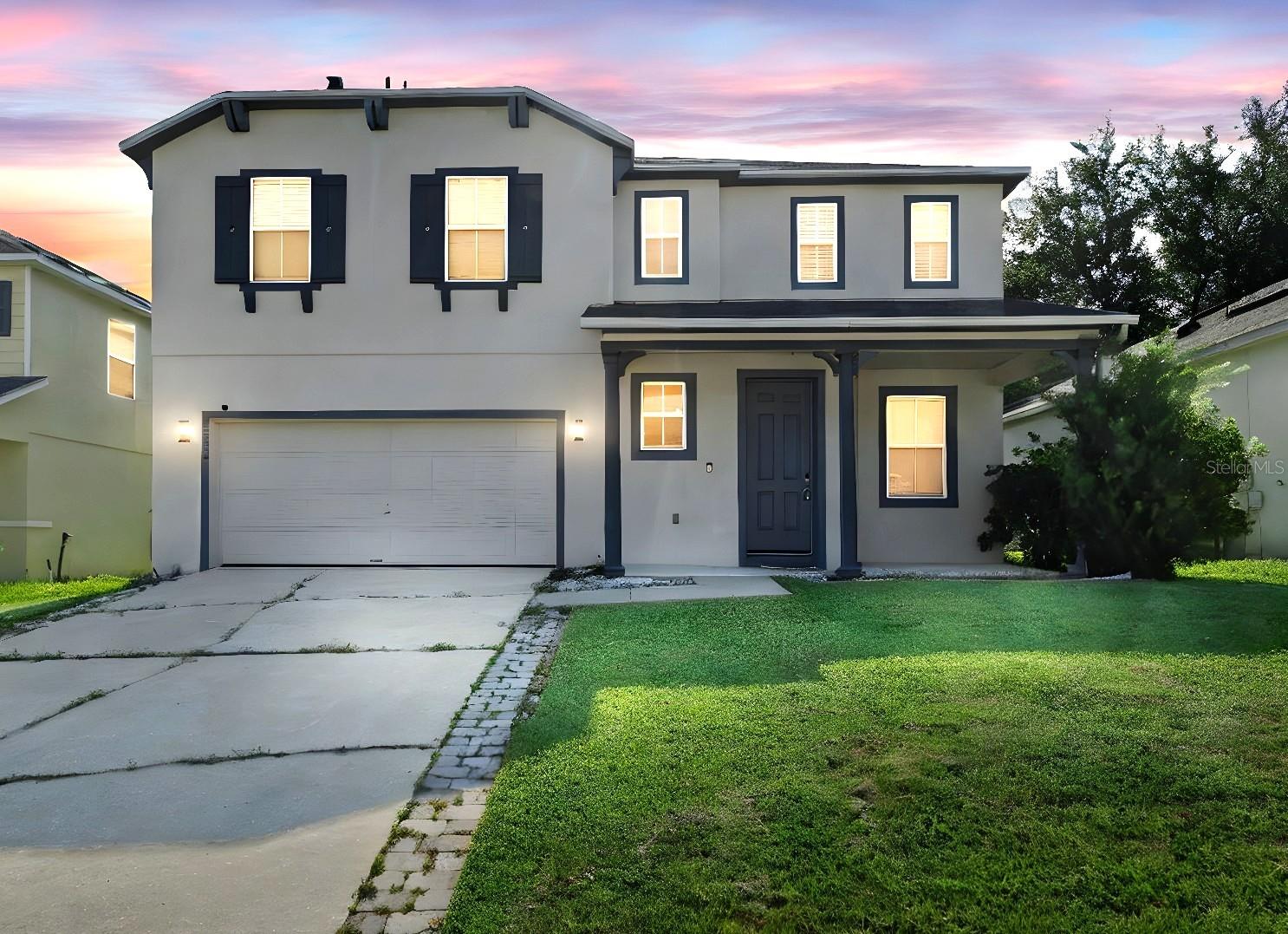 Available NOW! This move-in ready 4-bedroom, 2.5-bath home offers privacy and scenic views with no rear neighbors, backing directly onto a beautiful golf course. Thoughtfully upgraded throughout, the home features luxury vinyl flooring, a functional open layout, and a modern kitchen with granite countertops, stainless steel appliances, a breakfast bar, updated cabinetry, and a stylish backsplash. Upstairs, the oversized primary suite boasts a freestanding tub, double vanities, a walk-in shower, and a spacious walk-in closet. Additional highlights include smart home features, upgraded lighting, rain gutters, custom wood accents, and washer and dryer. Enjoy relaxing on the private patio while taking in peaceful golf course views. Located in a well-maintained HOA community with a pool, playground, and minutes from Publix, dining, shopping, attractions, major highways, and more! Schedule a private showing today.