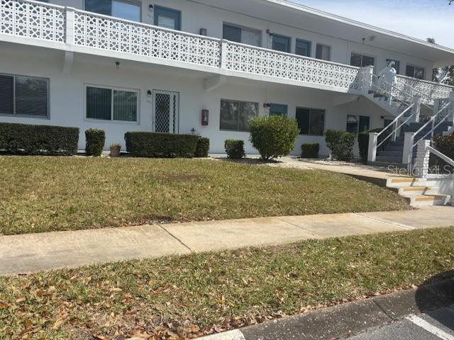 Move-In Ready 2BR condo in beautiful Seminole Gardens with private and relaxing balcony overlooking peaceful and serene outdoor area. Seminole Gardens is a Vibrant and Active 55+ Community with Heated Pool and Spa. Lots of Activities, Dancing, Party's, Potluck Diners, etc. Close to shopping and our beautiful Gulf Beaches. New Roof and building painted in 2024. No Milestone inspection required as building is only 2 story and each building within Seminole Gardens has a separate Board and HOA. Interior unit was freshly painted and new carpet installed in both bedrooms and closets in 2024. Furniture is negotiable. Taxes, Insurance, Maintenance and Land Lease Fee included in Monthly Condo. Fee of $773.67.