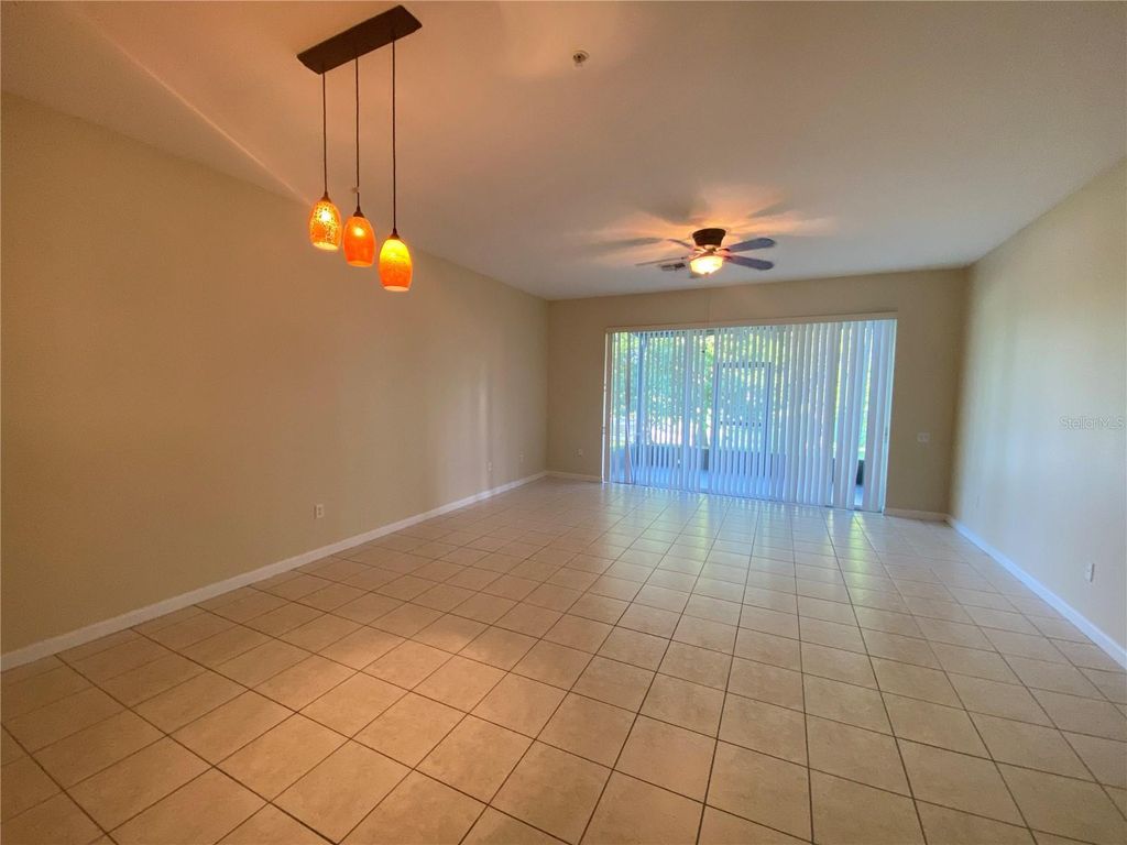 Photo of 3149 Stowe Street #102, Orlando, FL 32835 (MLS # O6361306)
