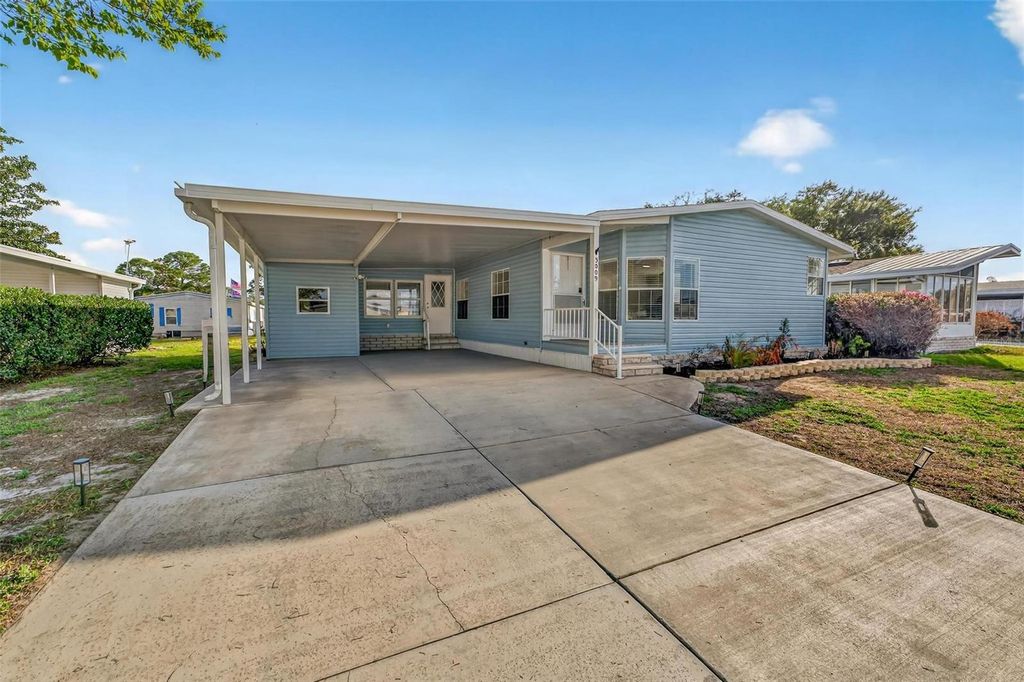 Photo of 3009 Manatee Road, Tavares, FL 32778 (MLS # O6387074)
