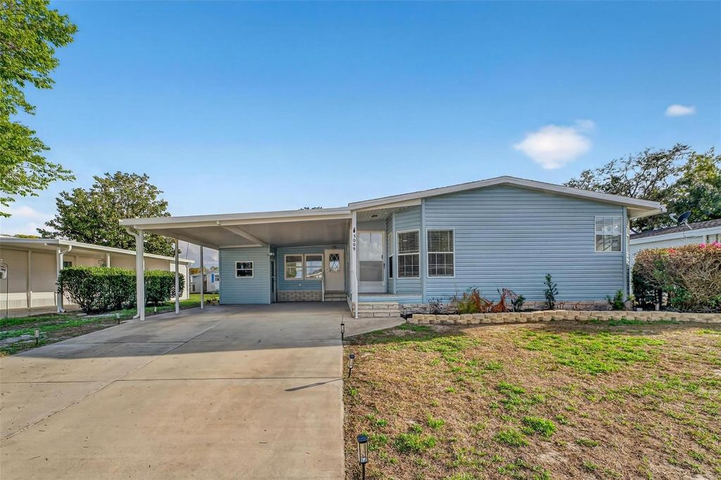 Photo of 3009 Manatee Road, Tavares, FL 32778 (MLS # O6387074)