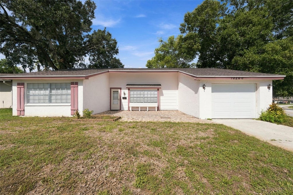 Photo of 12200 Bear Claw Loop, Hudson, FL 34667 (MLS # TB8534399)