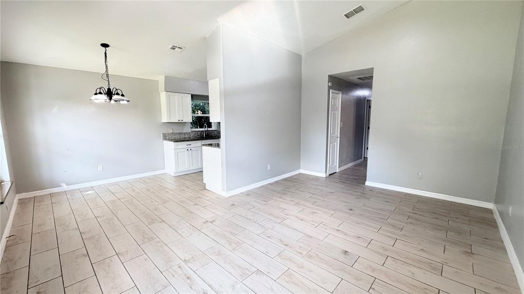 Photo of 11 E Ella J Gilmore Street, Apopka, FL 32703 (MLS # O6348026)