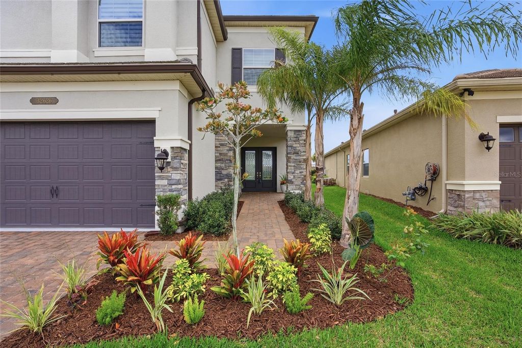 Photo of 32626 Tree Of Life Avenue, Wesley Chapel, FL 33543 (MLS # TB8485477)