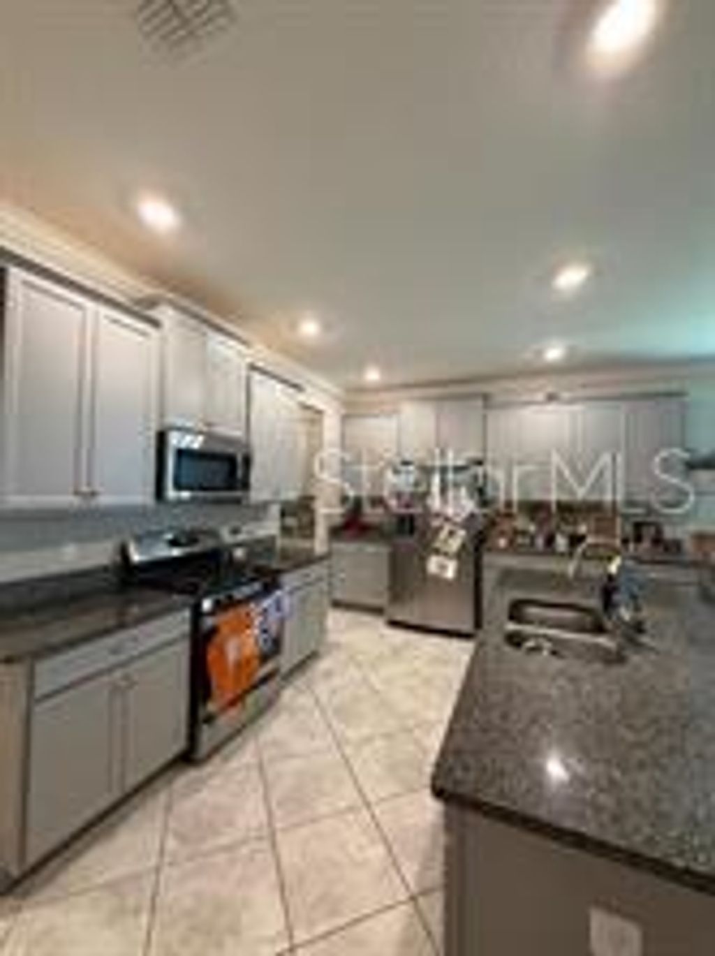 Photo of 25118 Lambrusco Loop, Lutz, FL 33559 (MLS # TB8477253)