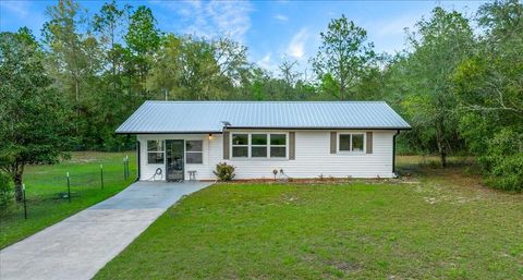 Photo of 23177 SW Beach Boulevard, Dunnellon, FL 34431 (MLS # OM721034)