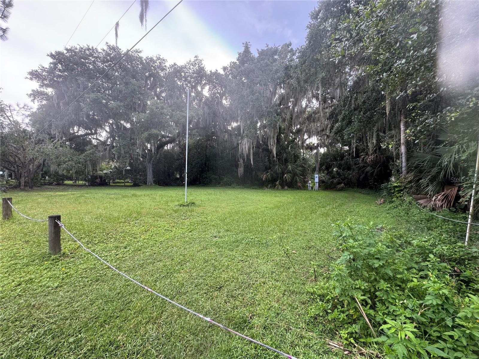 Negotiable ! Bring your own General Contractor, to design and build your country home or bring in your manufactured home on this 1.05 acre of land. Perfect for Air Boats lovers. Property has electric, well and septic systems. Storage Shed with covering on back of property. Beautiful lot for those who like their privacy. Survey attached.