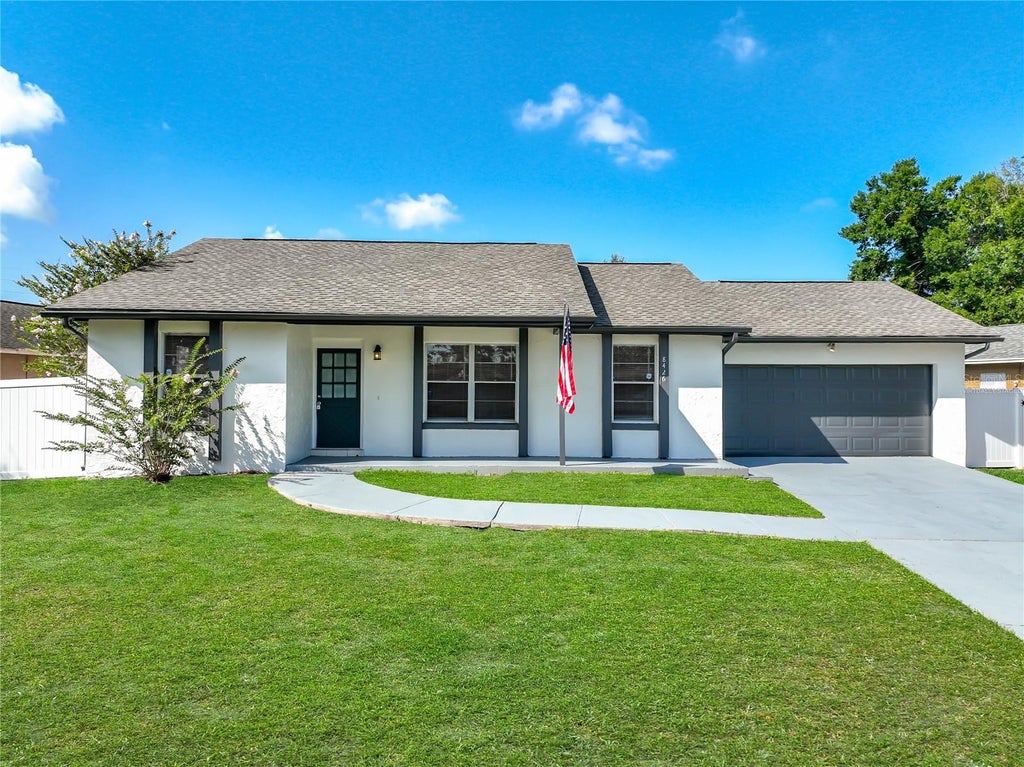 Photo of 8426 Village Green Rd, Orlando, FL 32818 (MLS # O6419473)
