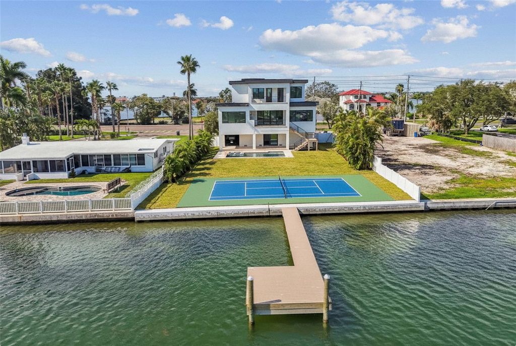 Photo of 3 Treasure Lane, Treasure Island, FL 33706 (MLS # TB8422429)