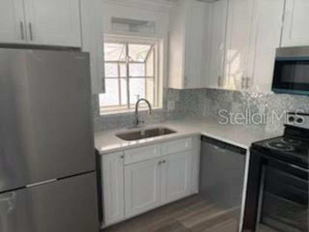 Photo of 1653 N Hastings Street, Orlando, FL 32808 (MLS # O6396296)