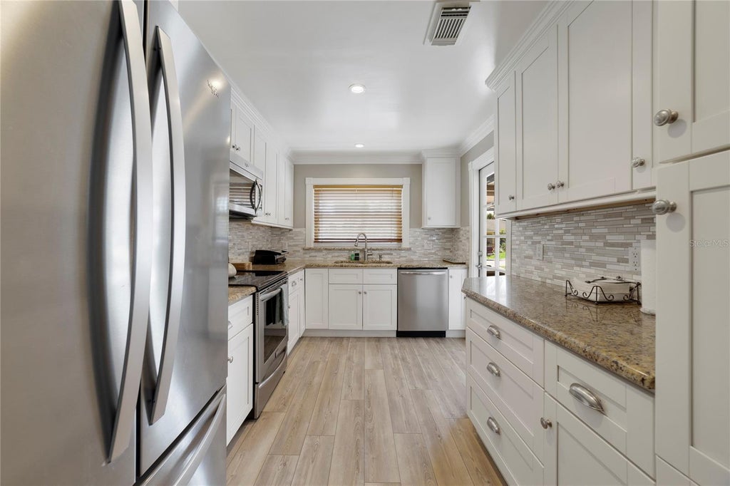Photo of 12631 Indiana Woods Lane, Orlando, FL 32824 (MLS # O6446247)