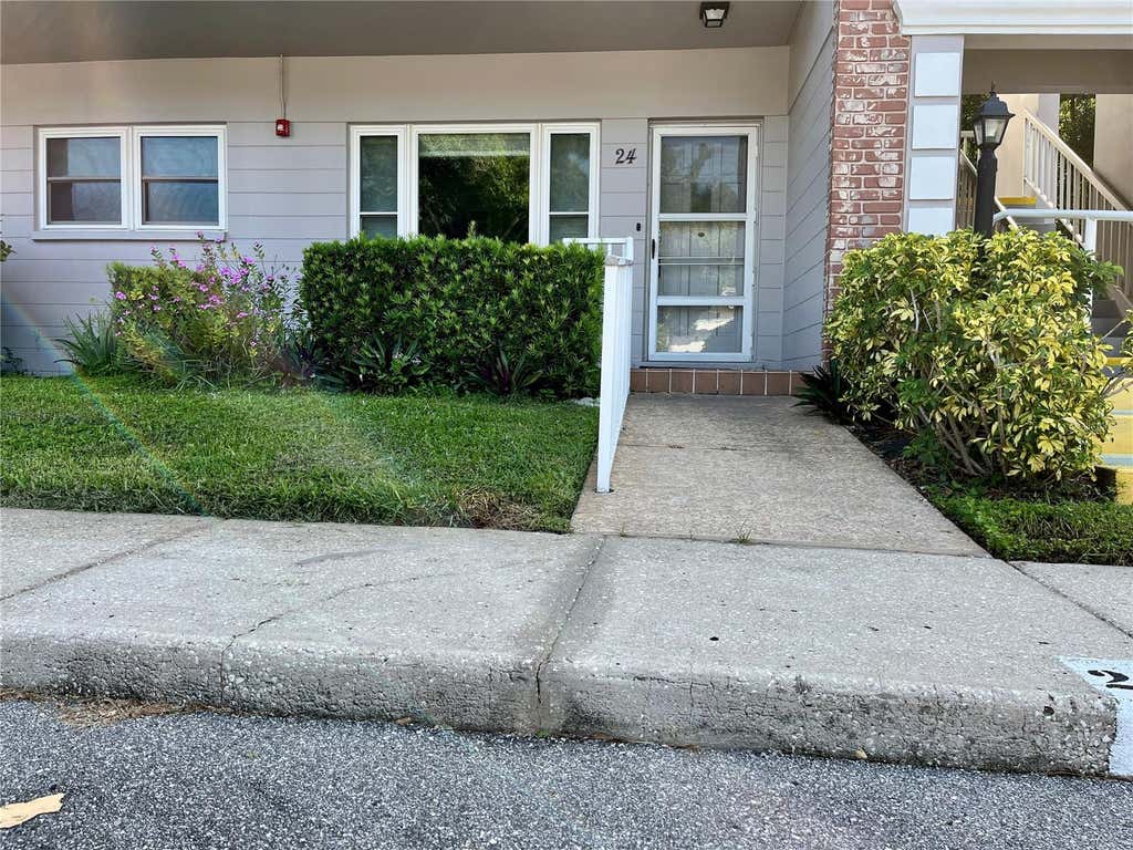 Photo of 2460 Persian Drive #24, Clearwater, FL 33763 (MLS # TB8527244)