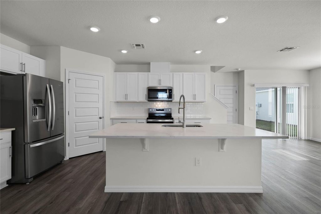 Photo of 1684 Hummingbird Road, Winter Haven, FL 33884 (MLS # O6354902)