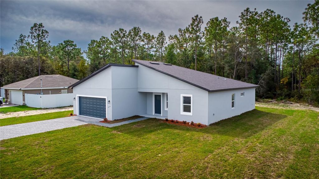 Photo of 6418 SW 155th Place, Ocala, FL 34473 (MLS # O6356244)