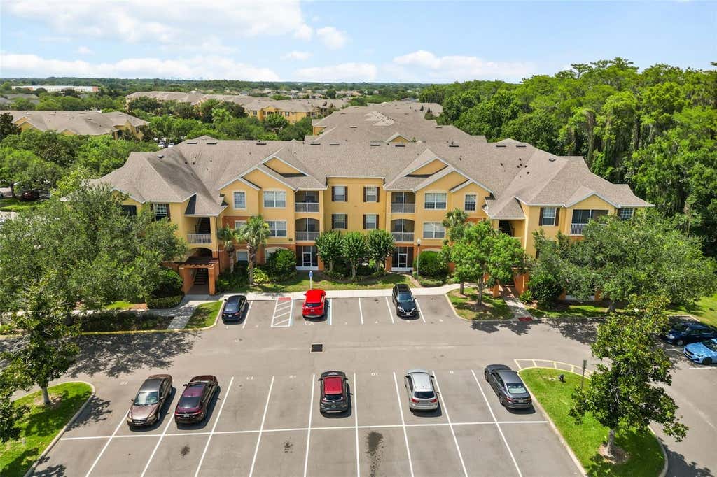 Photo of 8775 Sartori Street #303, Orlando, FL 32829 (MLS # O6414765)