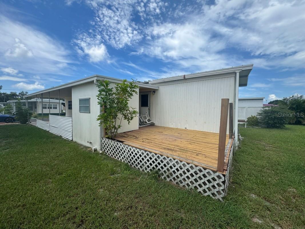 Affordable mobile home opportunity at 5375 6th Terrace S. This 2 bed/1 bath (672 sqft) comes with the land and just needs some TLC (panel repairs + cosmetics) but features a good roof, bonus room, back porch, HOA covering lawn care, amenities, and laundry. Perfect for handy retirees or investors in this non-gated community!