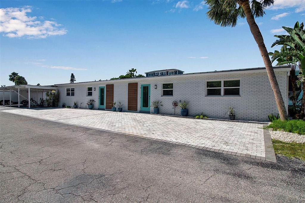 Photo of 713 Saint Judes Drive S #2, Longboat Key, FL 34228 (MLS # TB8460267)