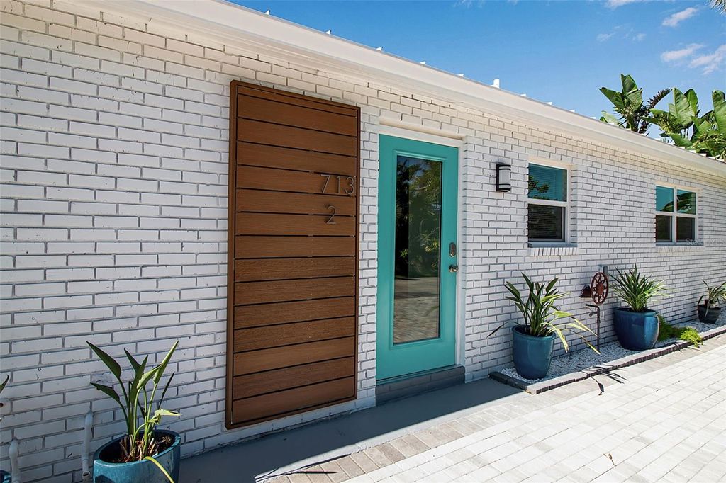 Photo of 713 Saint Judes Drive S #2, Longboat Key, FL 34228 (MLS # TB8460267)