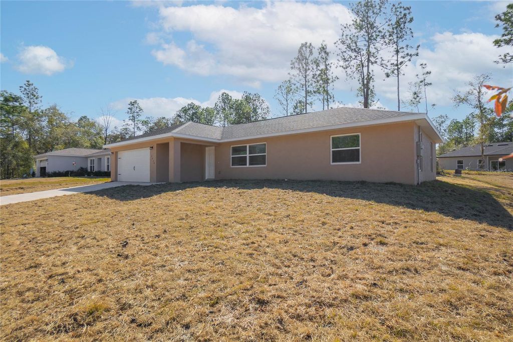 Photo of 2438 W Vespero Street, Citrus Springs, FL 34433 (MLS # OM722460)