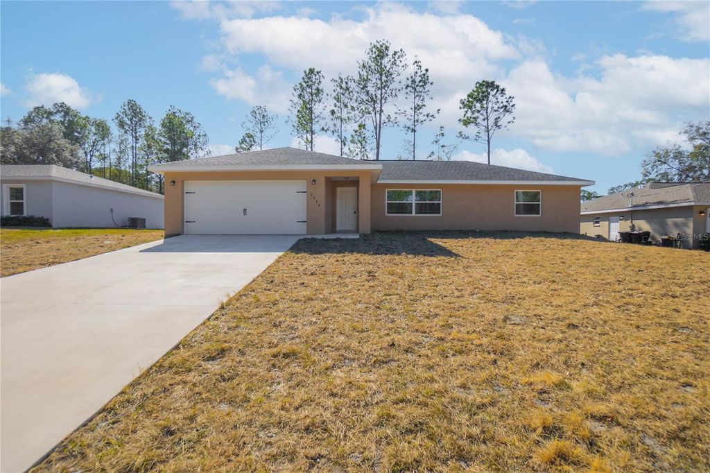 Photo of 2438 W Vespero Street, Citrus Springs, FL 34433 (MLS # OM722460)