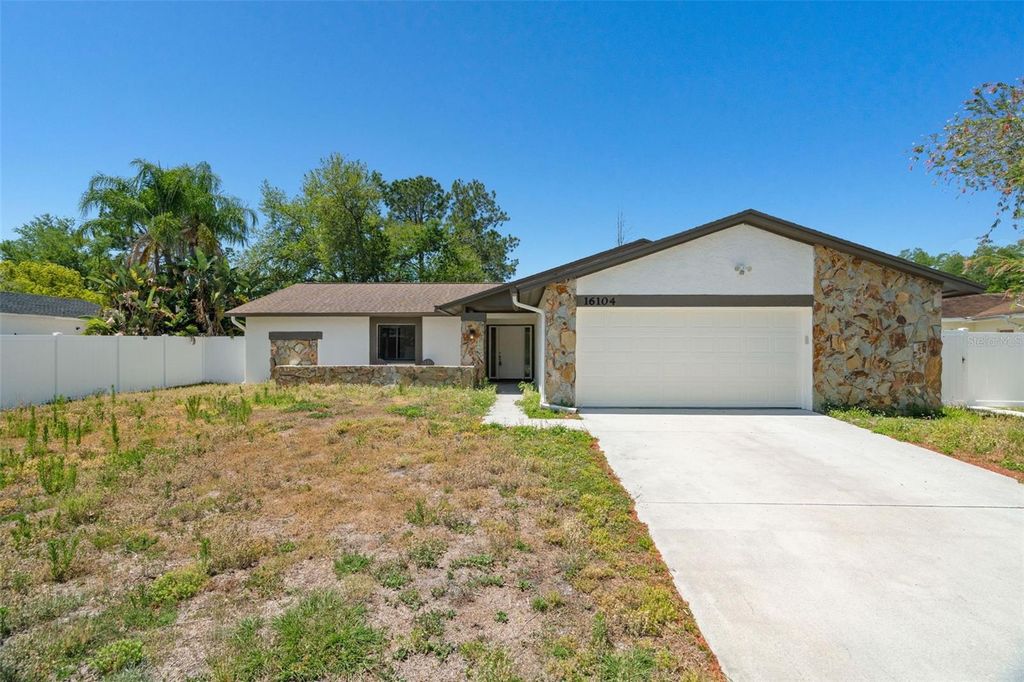 Photo of 16104 Country Crossing Dr, Tampa, FL 33624 (MLS # TB8504104)