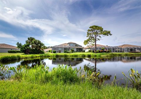 Photo of 8737 Pebble Creek Lane, Sarasota, FL 34238 (MLS # A4668301)