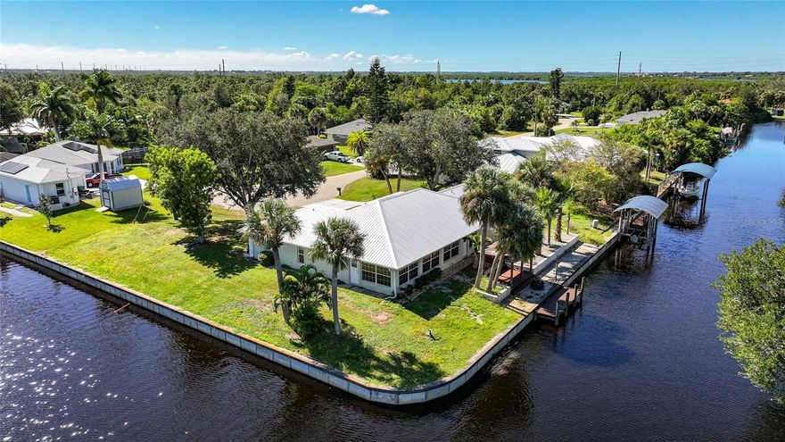 Water, water everywhere!
Don’t miss this incredible 3-bedroom, 2-bathroom waterfront home, perfectly positioned with stunning views of five intersecting canals and the Peace River. With nearly 250 feet of waterfront, this property truly embodies Florida waterfront living at its finest.

This home features a durable metal roof, a spacious master suite, and an open floor plan—ideal for entertaining family and friends or simply enjoying the serene water views. Whether you're relaxing on the patio or boating from your backyard, this home is a must-see for anyone seeking the ultimate waterfront lifestyle.