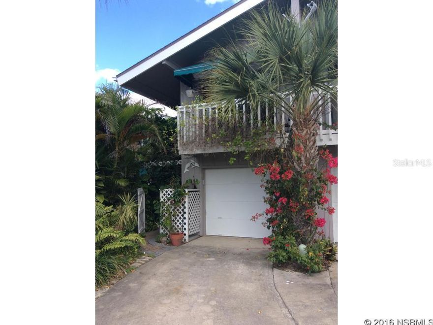 FANTASTIC DIRECT WATERFRONT TOWN HOME WITH BOATSLIP! Paradise from the time you enter the Tropical Courtyard.  Enjoy breathtaking views of the water as soon as you walk in.  Beautifully updated kitchen, wood burning fireplace, all tile on the 1st floor, additional enclosed room under air, 1 car garage.  Open staircase leads to 2nd floor with a landing which provides room for a office or extra sitting area.  Breathtaking views from the master bedroom with a balcony to enjoy the sunrise.  Newly remodeled master bathroom and guest bathroom, another balcony off the guest bedroom. Newer A/C, Hurricane Shutters, Security Camera. Centrally located between Canal St. and Flagler Ave. Paradise! ;Water: City