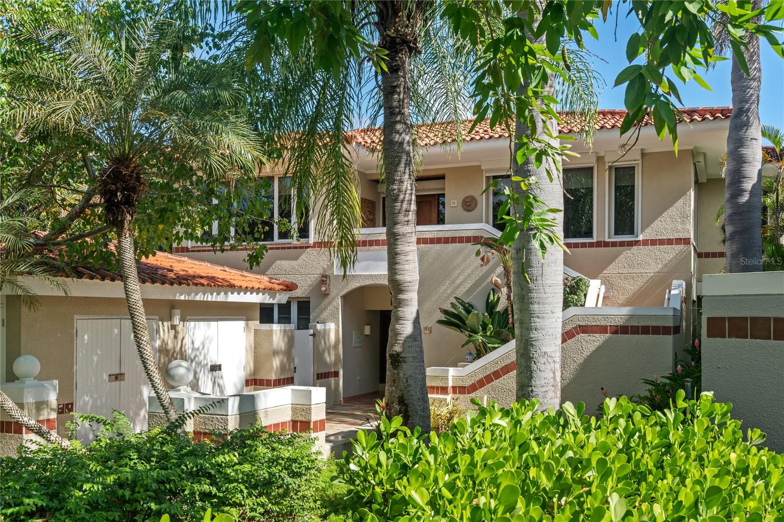 Experience out of the ordinary lifestyle at The Greens located within the esteemed Dorado Beach Resort. This 3-bedroom villa, designed with family vacations in mind, combines the best of both worlds: the serenity of a private home and the excitement of resort living.
?From the moment you step through the stucco, palm-lined entrance, you're greeted with the warmth and elegance that defines The Greens 32. The villa offers a generous layout that sleeps up to 8 guests, featuring a primary bedroom with a 4-poster king bed and tall windows that frame the beautifully landscaped gardens, a second bedroom with two full beds, and a third bedroom with a cozy queen-size bed.
?The heart of the home, a fully equipped kitchen, sits adjacent to a sunlit dining area that overlooks the resort's lush landscape. The living room, with its upholstered, deep-cushion couches, invites relaxation and family gatherings. The outdoor patio, a haven of tranquility, offers breathtaking views of the garden, lake, and ocean, perfect for quiet reflection or entertaining guests.
?The residence includes conveniences such as central air-conditioning across four zones, and a full suite of kitchen appliances. For those seeking adventure, the villa's proximity to Dorado's golden-white beaches, renowned golf courses, and the vibrant town of Dorado places you minutes away from entertainment, dining, and shopping.
Amenities within the gated community include a modern pool, tennis courts, and access to the exclusive Dorado Beach Resort. Here, you can indulge in spa treatments at Spa Botánico, partake in "Goodwinds Water Sports," or join the "Ambassador of the Environment Program" for families.
The Greens is more than just a residence; it's a gateway to a lifestyle of comfort, adventure and endless possibilities. Just 35 minutes from the bustling attractions of San Juan, it promises a sanctuary of peace and adventure for your family in the paradise of Dorado Beach Resort.