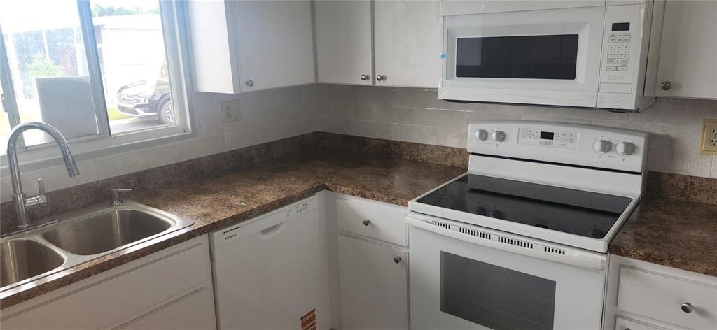 Photo of 10908 Freedom Drive, Port Richey, FL 34668 (MLS # W7877266)