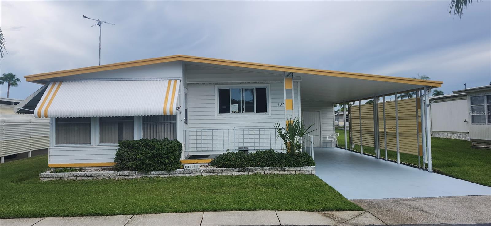 Charming and move-in ready, this 2-bedroom, 2-bathroom double-wide manufactured home is located in the sought-after 55+ resident-owned gated community of Senate Manor in Port Richey. Built in 1974, this home features a spacious layout with a private primary suite, brand-new luxury vinyl plank flooring throughout, and a newly renovated kitchen with modern cabinetry and appliances. A screen-enclosed front porch provides a cozy outdoor space, while a covered carport and utility shed for a washer/dryer. Please note: the home did experience flooding during Hurricane Helene. Senate Manor offers a strong sense of community with a low $200/month HOA that includes water, sewer, trash (with recycling twice weekly), lawn maintenance, street lighting, a heated pool and spa, shuffleboard, horseshoes, a clubhouse, gym, and optional storage for boats, RVs, and trailers. The social calendar is packed with fun events, including Taco Tuesdays, potluck dinners, strength training, line dancing, bingo, and more. Ideally located near Gulf beaches, shopping, dining, and medical facilities, this home blends comfort, convenience, and community. Seller will consider contingent offers—be sure to view the photos, and visit the Senate Manor Estates HOA website for more details. OR documents attached to this lisitng. Seller owns another unit nearby if you would like 2 homes.