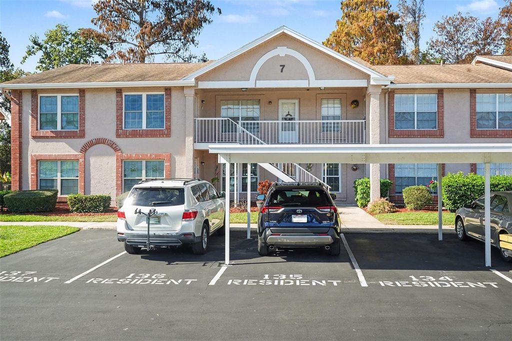 Photo of 4821 Myrtle Oak Drive #12, New Port Richey, FL 34653 (MLS # TB8463282)