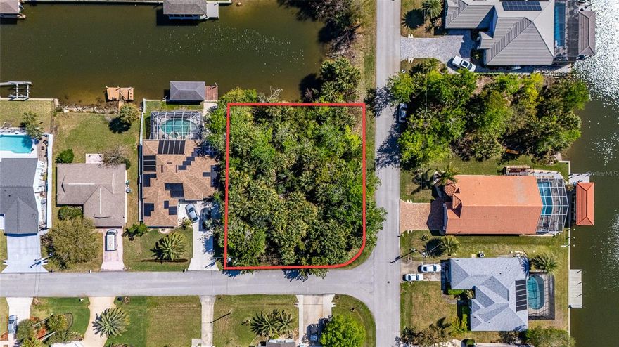 Build Your Waterfront Dream in Paradise! Take this opportunity to own a saltwater canal lot tucked away at the end of a quiet cul-de-sac, offering privacy and over 13,000 sq. ft. of space to create your ideal Florida retreat. Bring your boat, fishing pole, and love for the outdoors—this property provides an easy route to the Intracoastal Waterway, making it perfect for boating and waterfront living. Enjoy peaceful canal views while feeding the fish right from your backyard. Design and build your dream home exactly the way you want with: No HOA, No required timeframe to build, and you can choose your own builder. Whether you envision a custom home with a pool, outdoor kitchen, or private dock, this oversized lot gives you the flexibility to bring your vision to life. Conveniently located just a short drive to beautiful beaches, golf courses, restaurants, shopping, and everyday essentials, this property truly offers the best of Florida living. Don’t miss this opportunity—contact me today to get started!
